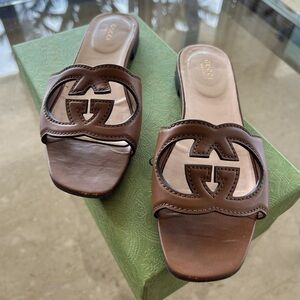 Gucci cutout brown sandal slides
